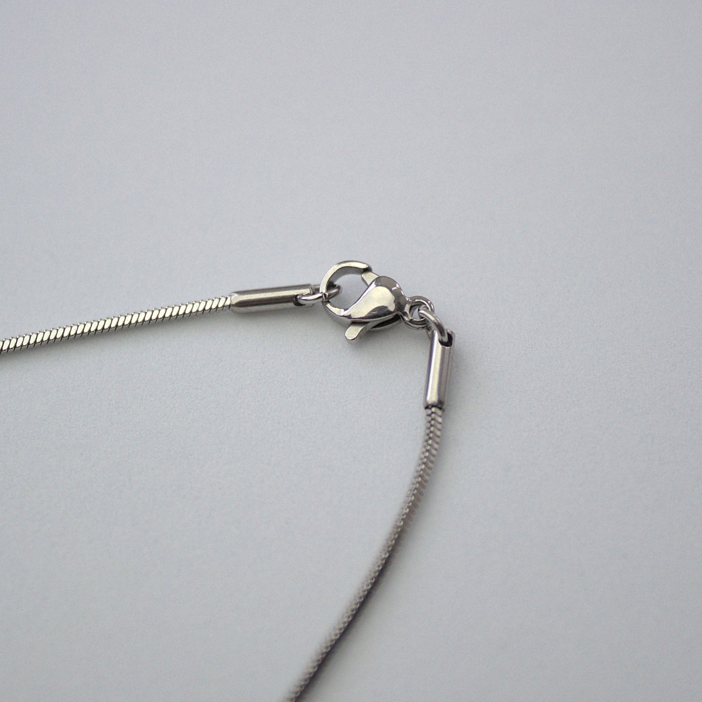 Lobster clasp, mens 1mm snake chain.